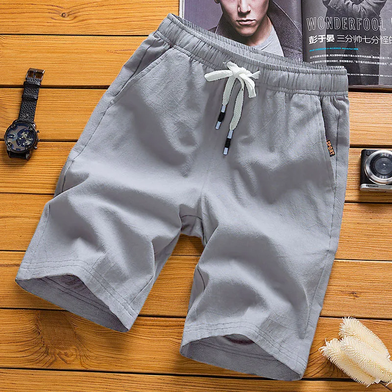 Summer new men's imitation linen breathable shorts Hawaii beach pants men's solid color shorts loose multi-functional street wea