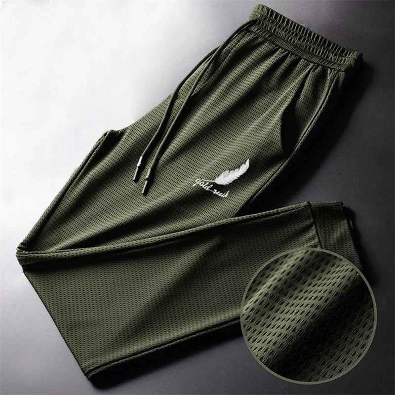 Men's Hollow Out Ice Silk Pants Mesh Breathable Casual Thin Quick Dry Pant Loose Elastic Beam Feet Pants Sports Fitness Trousers