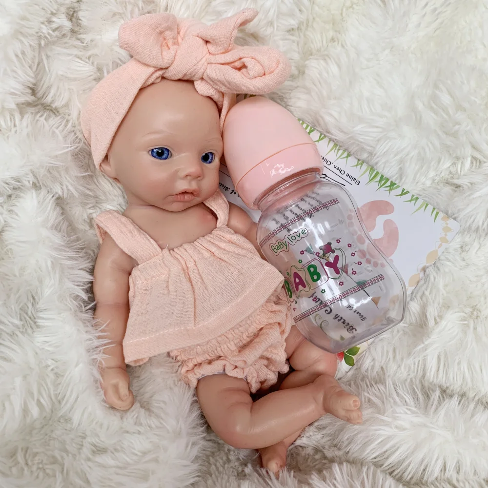 10 Inch Meadow Full Body Silicone Reborn Doll With Pink Outfit Lifelike Newborn Hand‑Painted Waterproof Collectible Art Ornament for Holiday & Birthday Gifts
