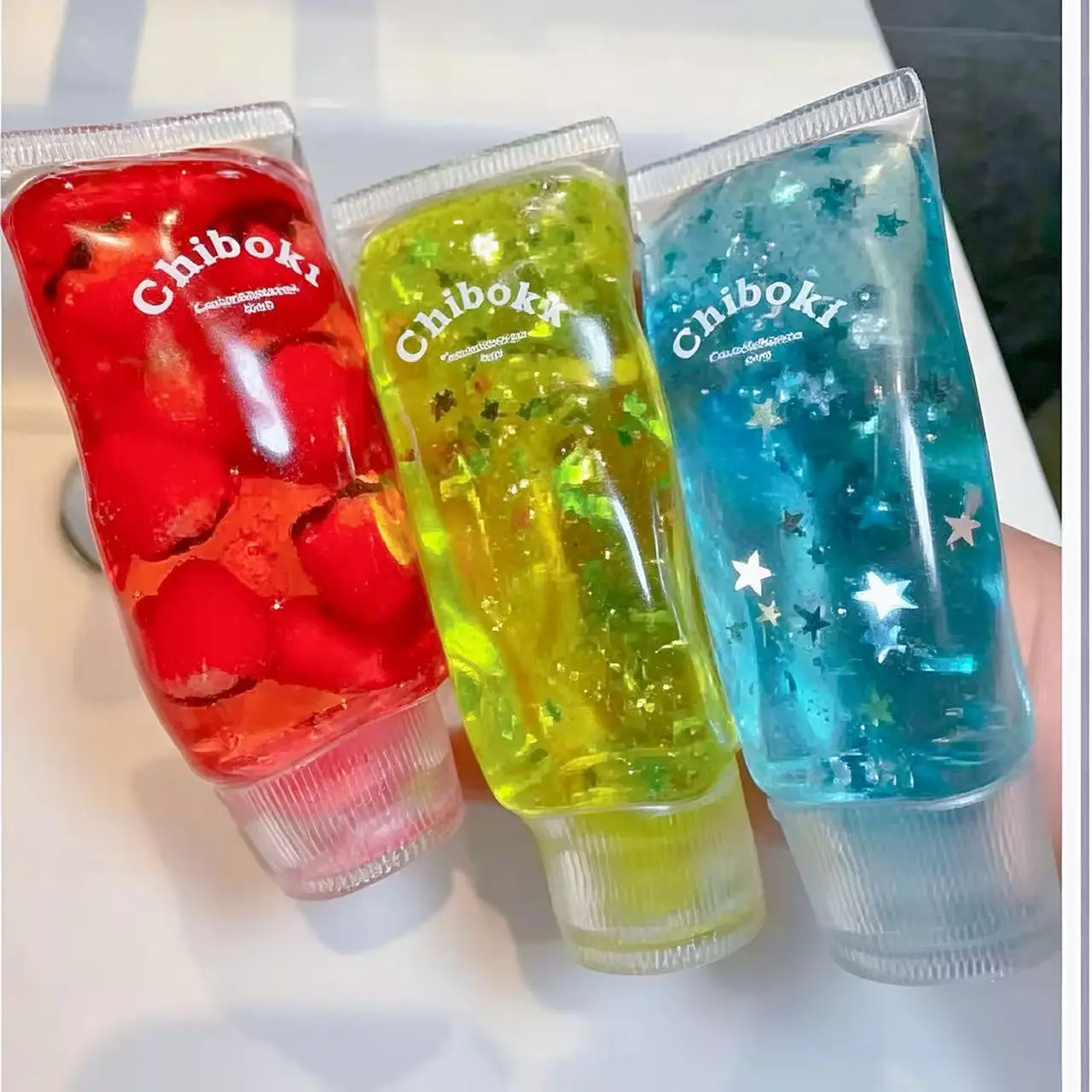 1pc Mini Fruit Drink Bottle Squishy Toy, Transparent Water Bottle Squeeze Fidget Toy, 3D Fruit Inside Pinch Toy, Novelty Stress Relief Hand Toy for Teens Adults