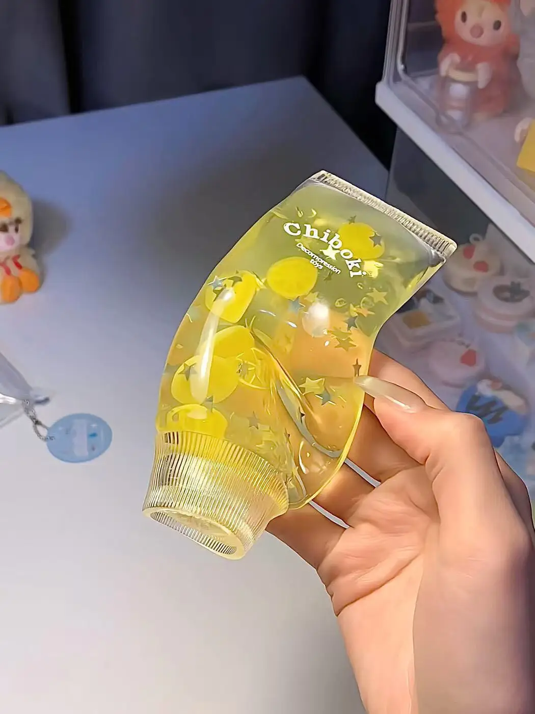 1pc Mini Fruit Drink Bottle Squishy Toy, Transparent Water Bottle Squeeze Fidget Toy, 3D Fruit Inside Pinch Toy, Novelty Stress Relief Hand Toy for Teens Adults