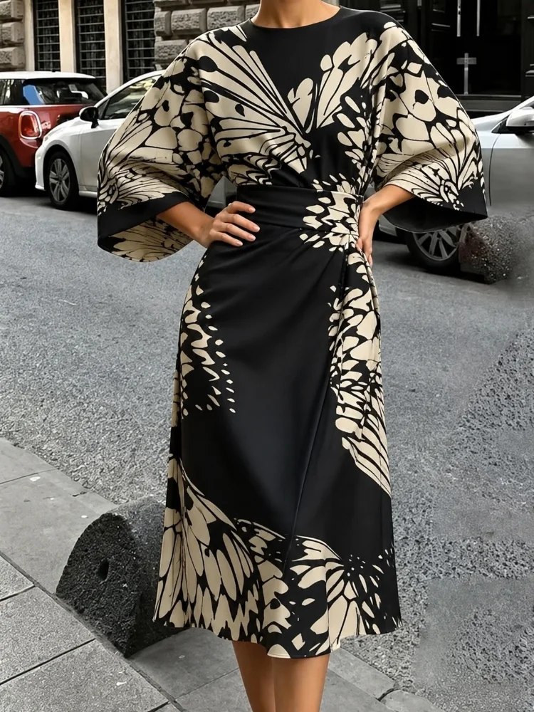 The New Fashionable Ladies Satin Mid-Length Dress Features a High-Waist, Form-Fitting and Anti-Wrinkle Design. It Has Black and White butterfly Prints, Batwing Sleeves and Loose-Fitting A-Line Cut. The Elegant V-Neck A-Shaped Skirt Design Is Suitable for