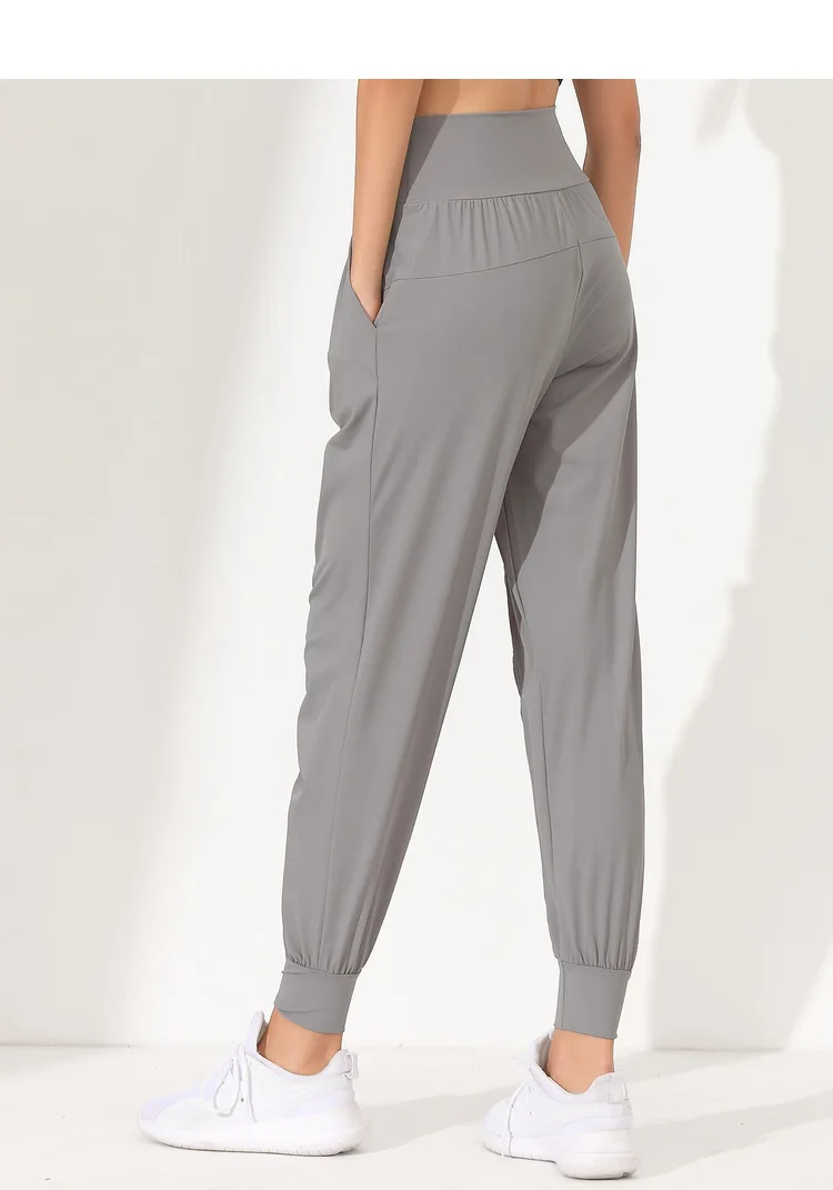 Woman Yoga Pants Loose Slim Quick-Dry Yoga Pants Pleated Hem Bound Running Fitness Capris Pockets Jogging Pants Sports Pants