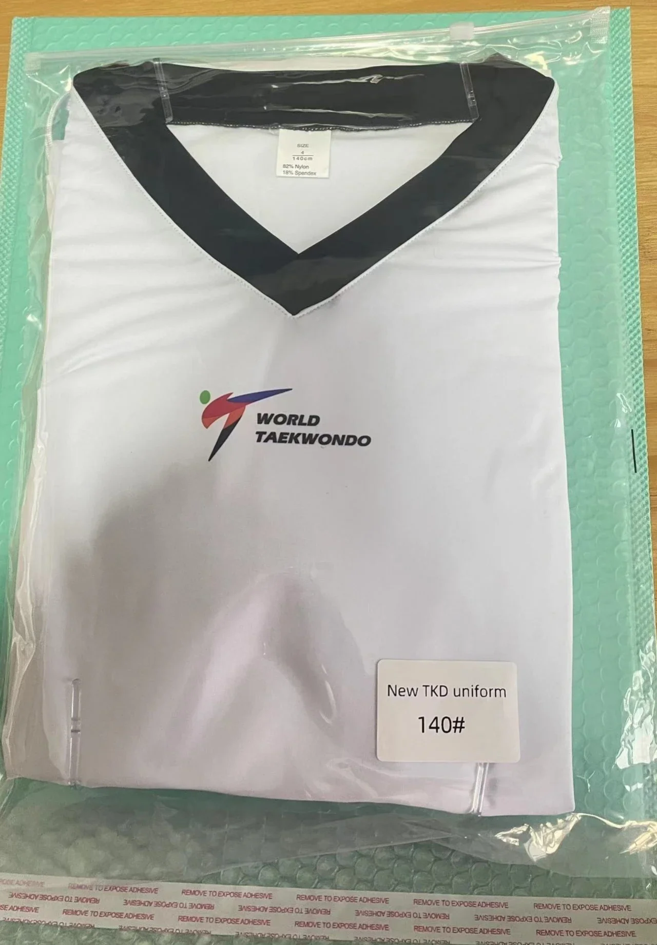 2025 Nieuwe stijl Taekwondo-uniform Nauwsluitend Stretch Sneldrogend Unisex Competitiepak Combat Dobok Logo aanpassen Wit