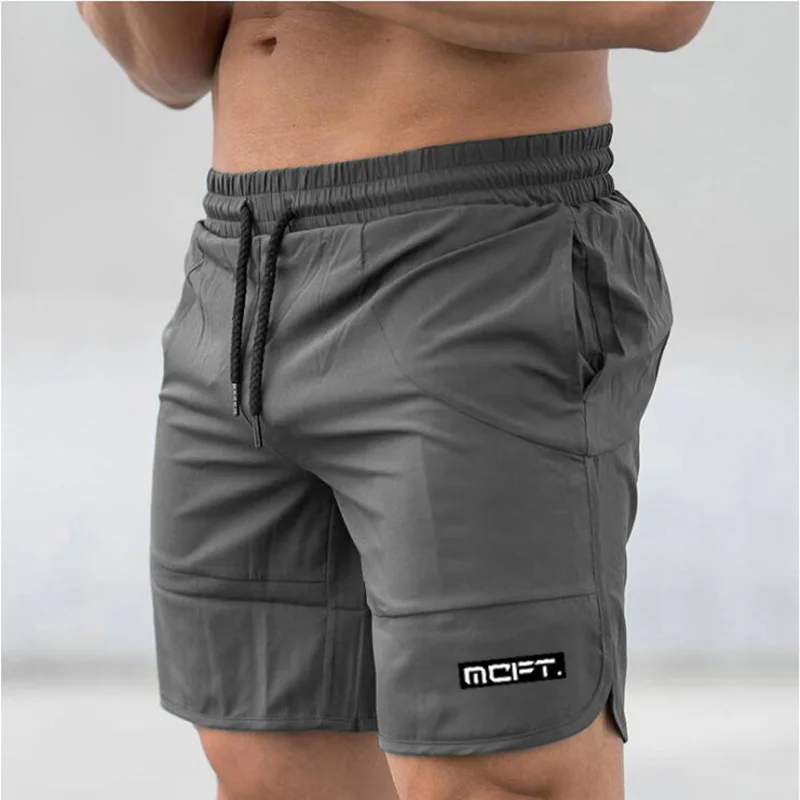 Men's summer quick-drying breathable loose Running Cropped pants gray Stretch Breathable Cool Beach elastic waist shorts