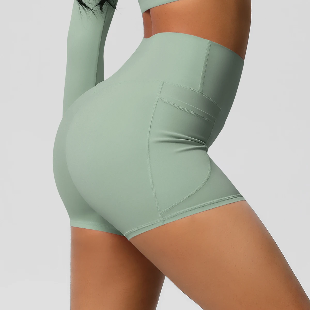 Women's Solid Color Nylon Yoga Tightening Tummy Lifting Shorts Outdoor Cycling Running With Pockets Sports Shorts Gym Pilates