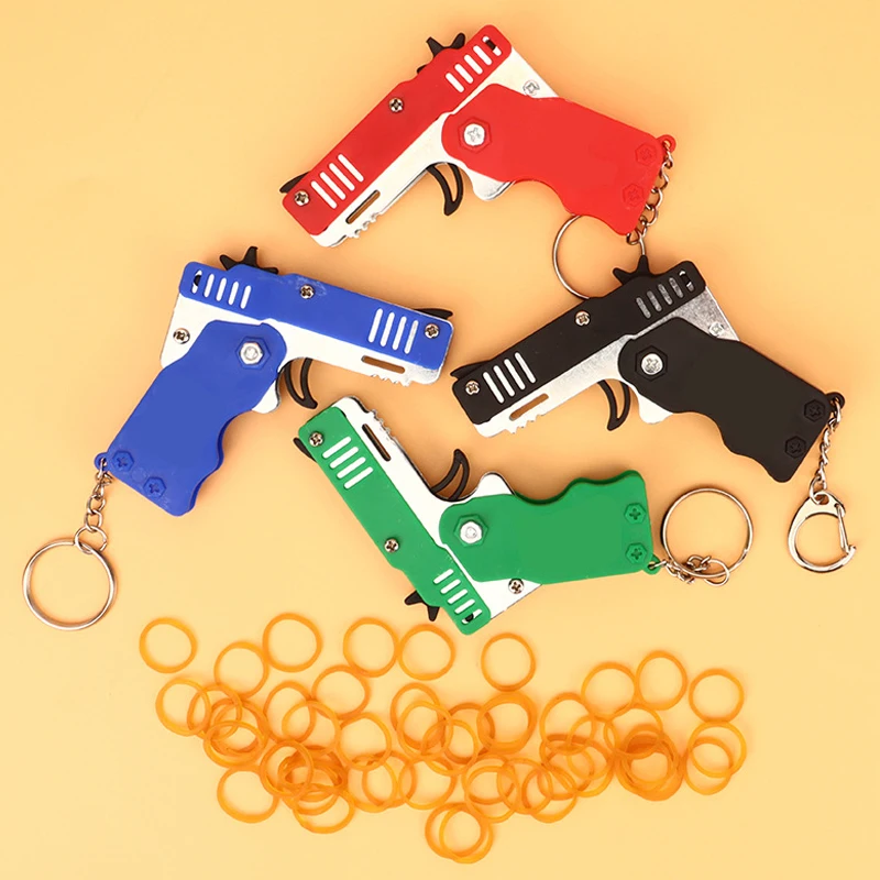 Mini Keychain Rubber Band Gun Toy Metal Folding Rubber Band Launcher Toy Gun Shooting Pistol Kids Outdoor Activities Party Game