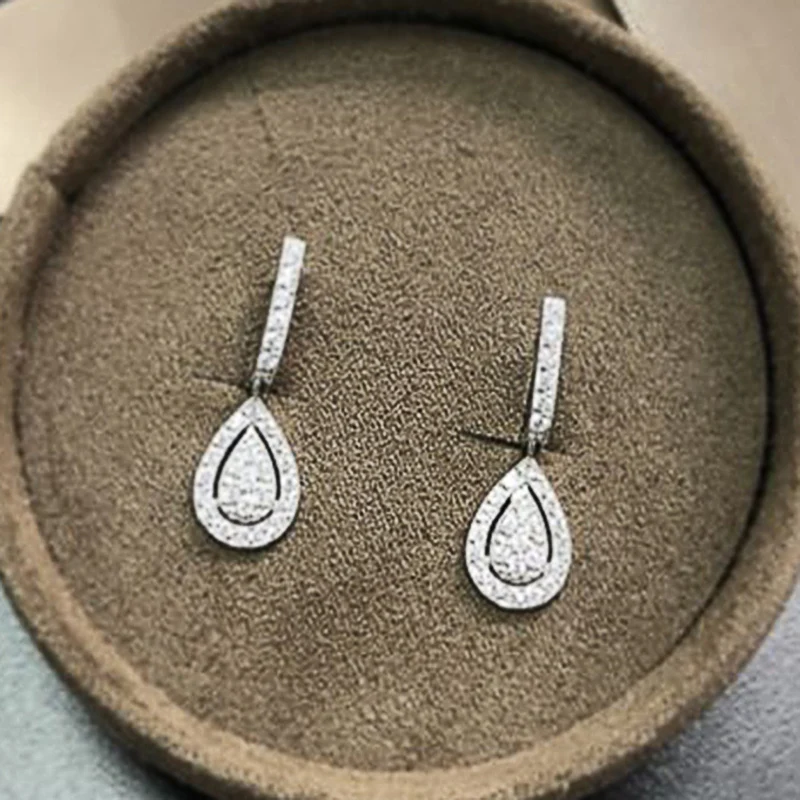 Huitan Silver Color Pear Shaped Drop Earrings for Women Full Paved White Cubic Zirconia Delicate Lady Earrings Statement Jewelry