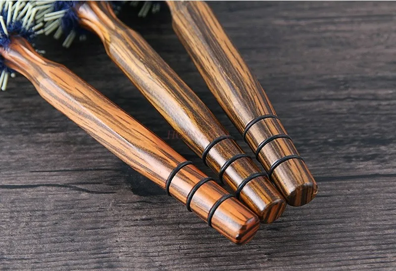 Swine bristle curly hair comb with inner buckle blowing design comb, wooden comb, fluffy head, cylindrical curly comb