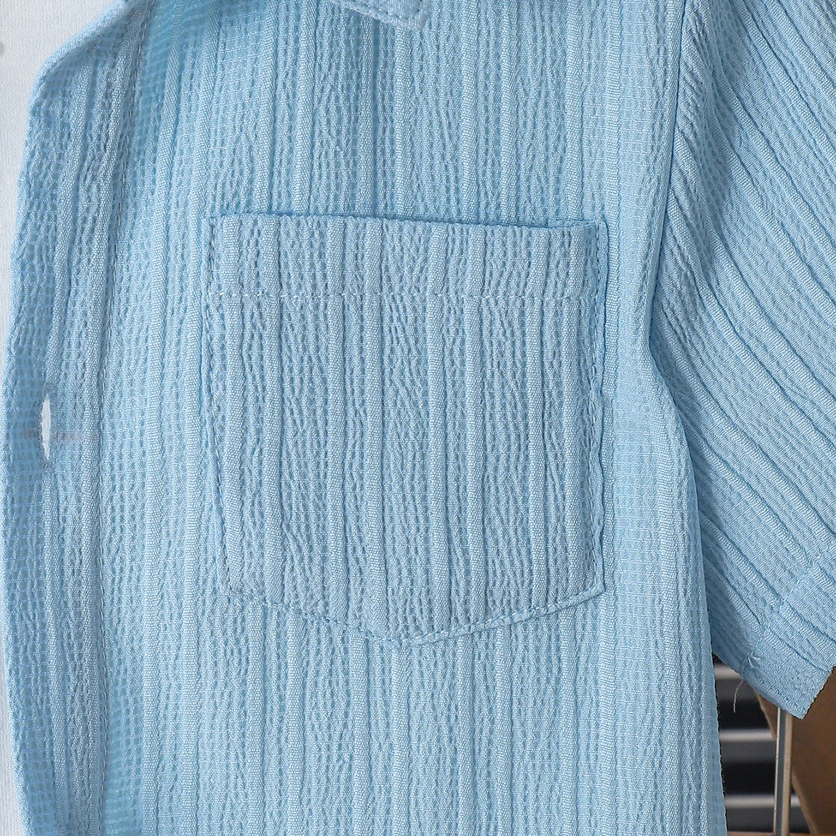 New summer men's short-sleeved woven pure blue button pocket + loose shorts two-piece set