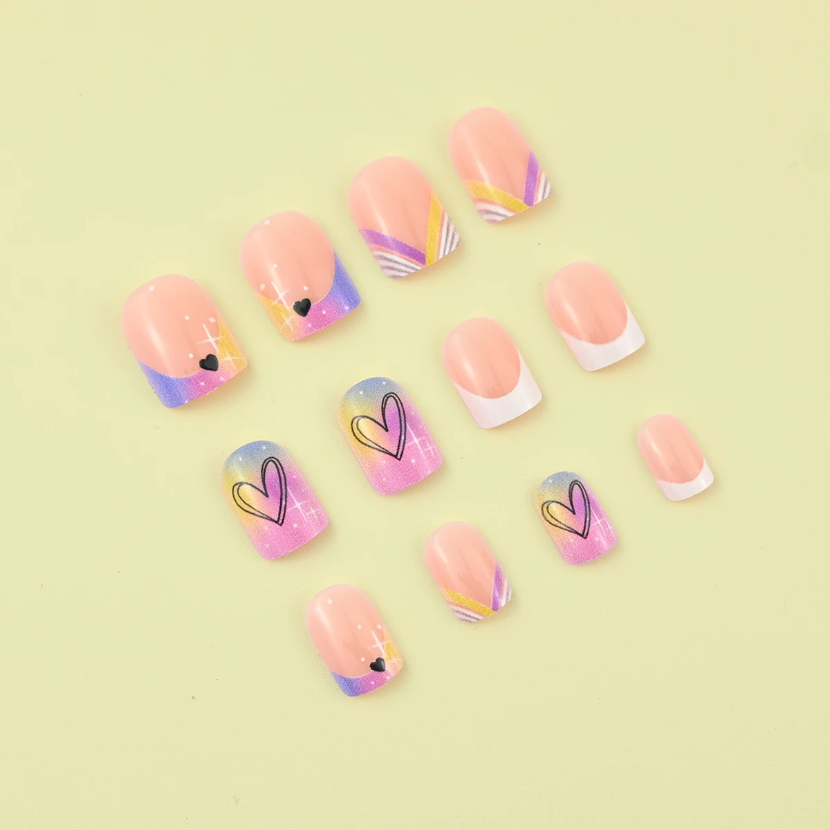 24 pieces of short square fake nails, featuring a halo dyed gradient heart and a colorful French design in European and American