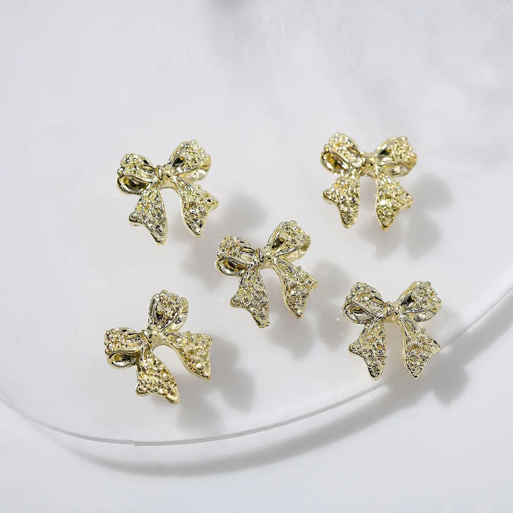 50Pcs 3D Luxury Shiny Metal Bow Nail Charms 10.5*11mm Alloy Gold Silver Ribbon Bowknots Nail Art Jewelry Cute Nail Art Accessor