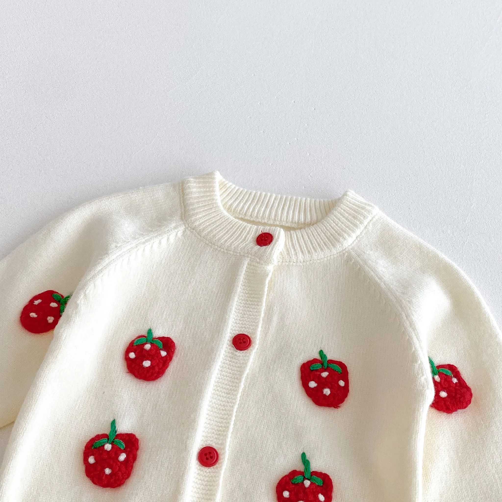 For Autumn and Winter, a Cute Strawberry-Embroidered Cardigan and Shorts Knitted Sweater Set For a baby Girl to Go out