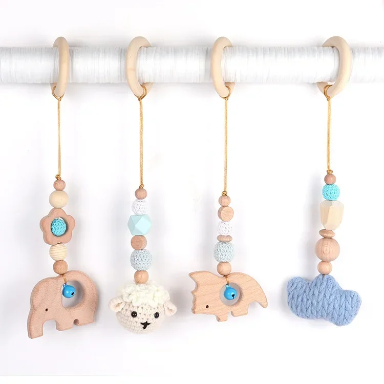 4Pcs/Set Baby Rattles Baby Play Gym Frame Wooden Beech Teether Trolley Stroller Hanging Pendants Toys Ring Nursing Rattle Toys