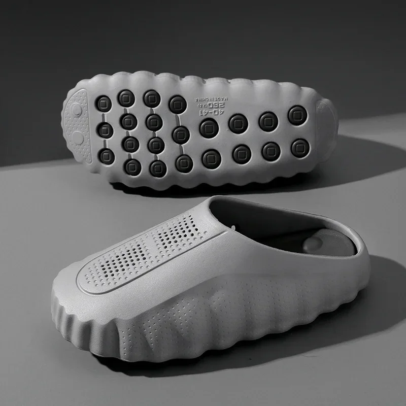popular cross-border slippers men's and women's baotou hole shoes thick-soled eva stepping on shit massage recovery coolslippers