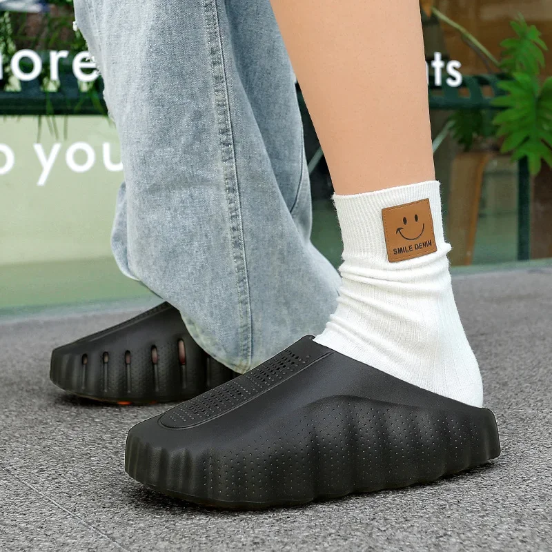 popular cross-border slippers men's and women's baotou hole shoes thick-soled eva stepping on shit massage recovery coolslippers