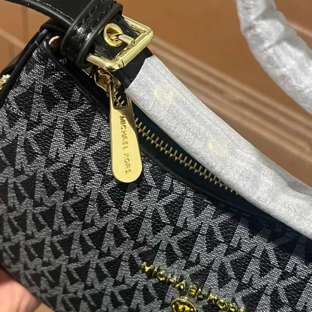 2026 Michael Kors Women's Single Shoulder Crossbody Bag Classic Letter Printed Crescent Bag MK Fashion Commuter Bag