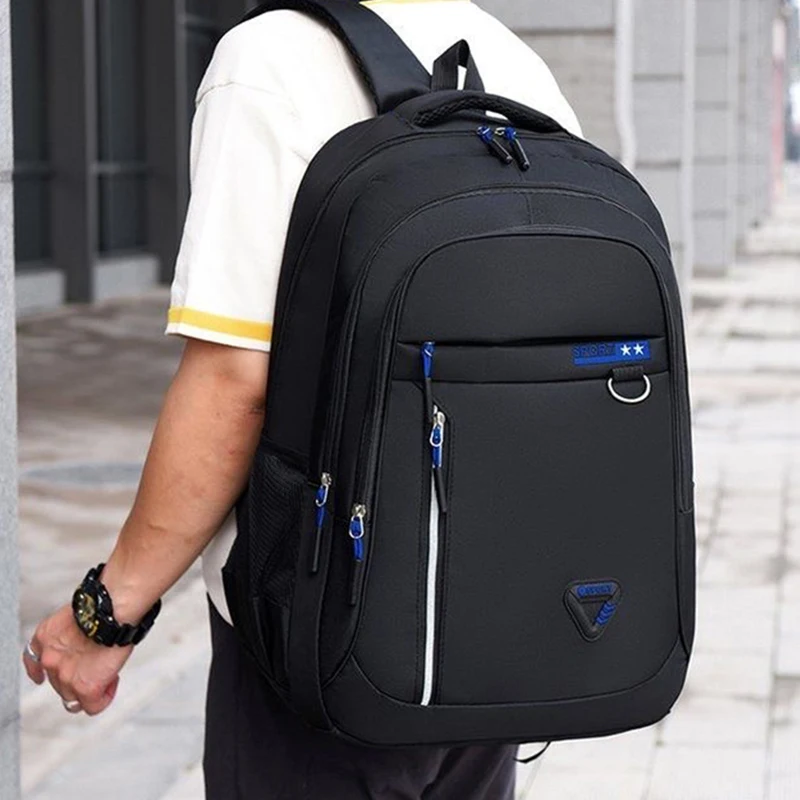 Neutral brand multi-layered backpack for men and women with various pockets,suitable for business trips.Made of nylon material.