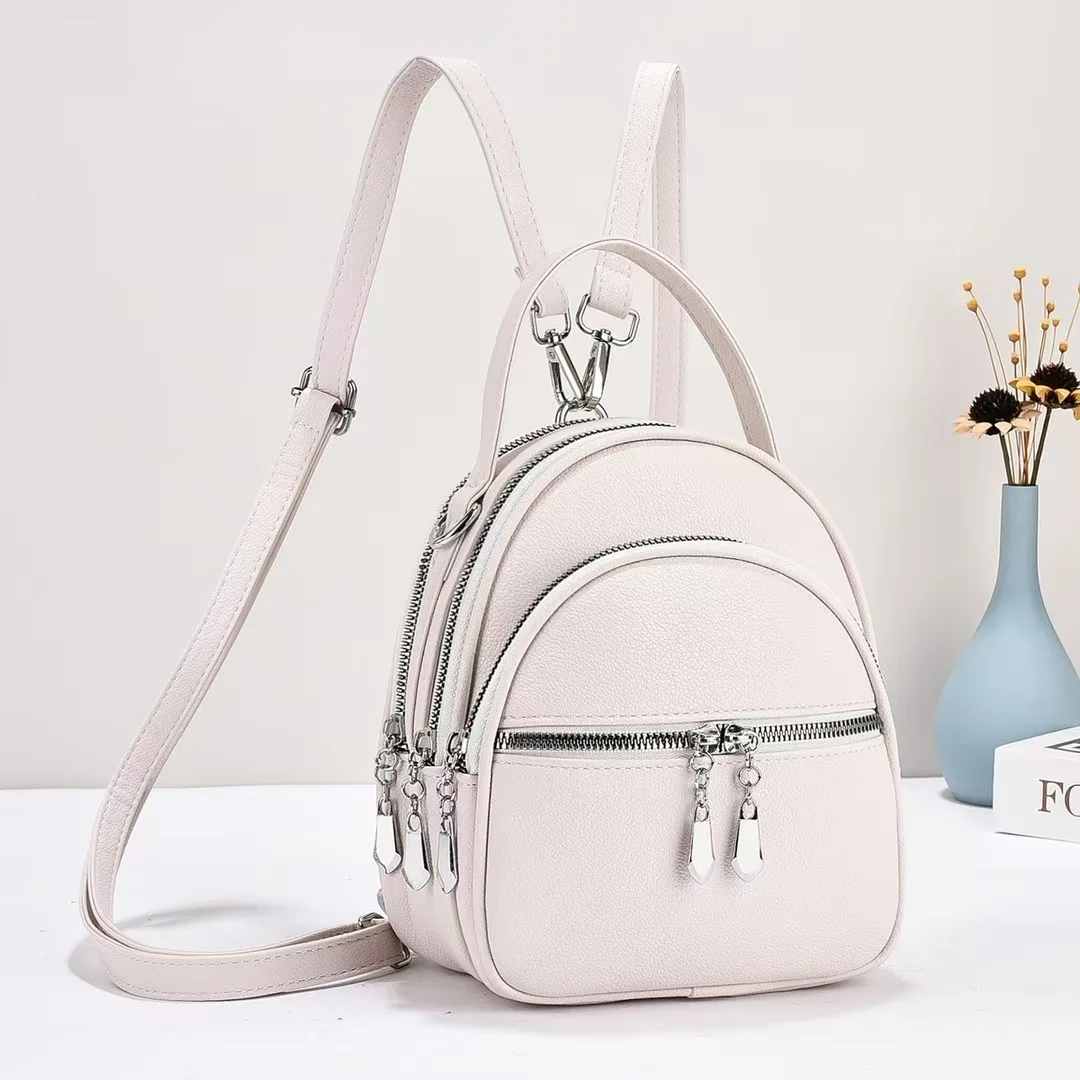 A High-Quality Multi-Functional Small Backpack for Ladies, a New Mini Handbag in Solid Color, with a Casual School Style