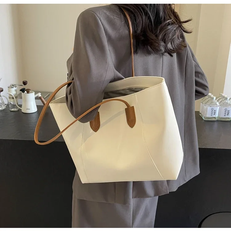Hot Selling Light Luxury Sewing Thread PU Zipper Women's Handbag High Quality Fashionable Commuting Women's Shoulder Bag