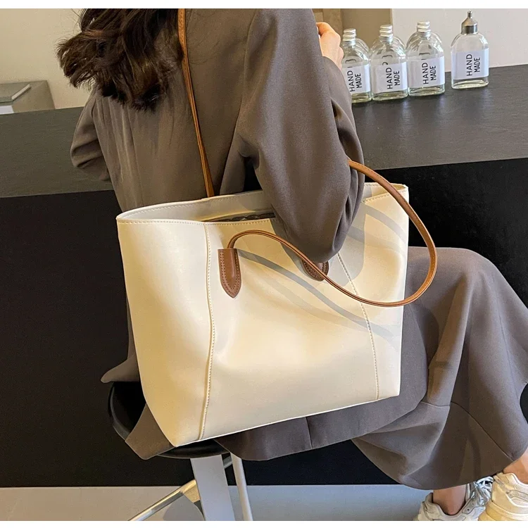 Hot Selling Light Luxury Sewing Thread PU Zipper Women's Handbag High Quality Fashionable Commuting Women's Shoulder Bag