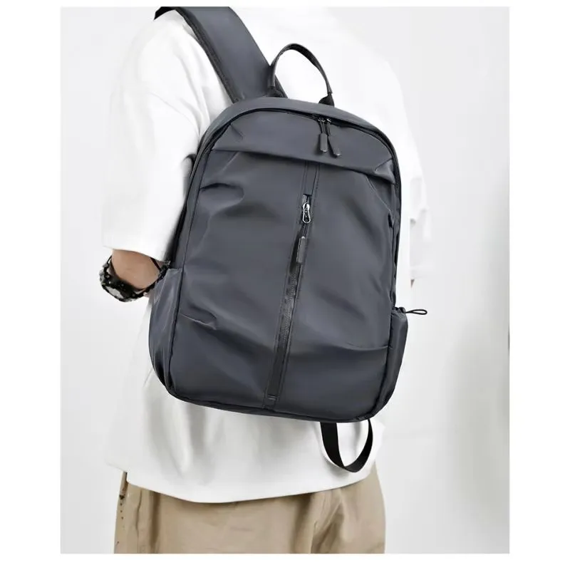 Men's water-resistant backpack with spacious compartments, perfect for laptops, travel, business, and student use