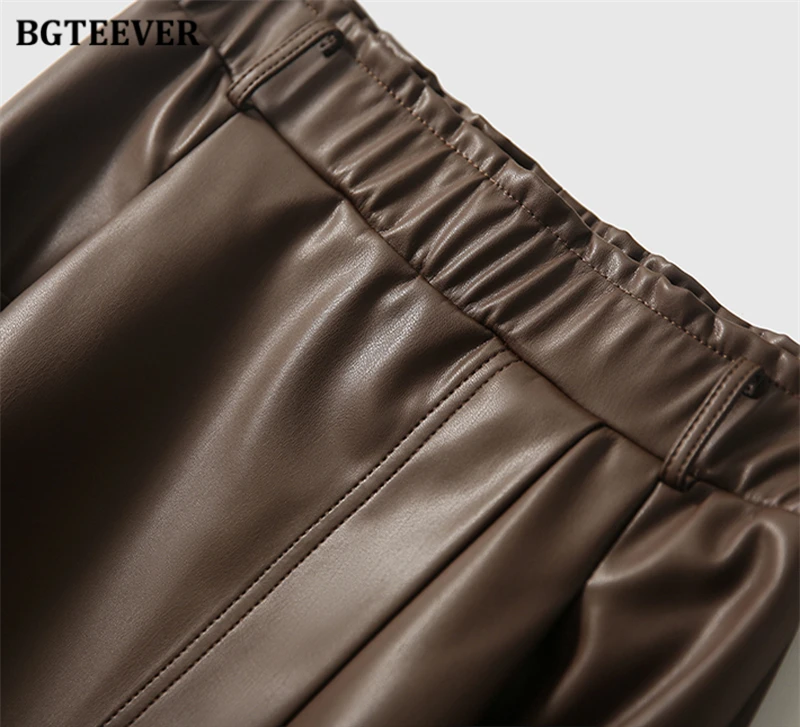 BGTEEVER Stylish Elastic Waist Women PU Leather Skirts Spring Autumn Loose Pockets Faux Leather A-line Skirts Female