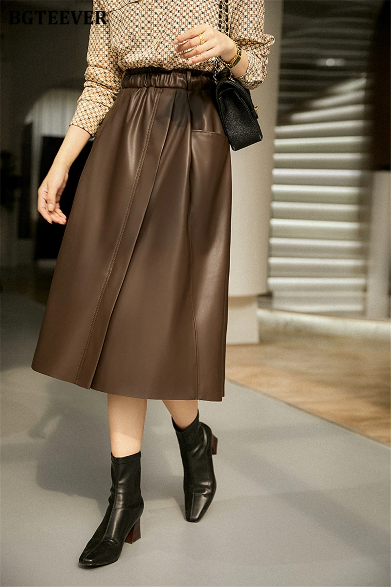 BGTEEVER Stylish Elastic Waist Women PU Leather Skirts Spring Autumn Loose Pockets Faux Leather A-line Skirts Female