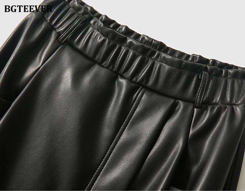 BGTEEVER Stylish Elastic Waist Women PU Leather Skirts Spring Autumn Loose Pockets Faux Leather A-line Skirts Female