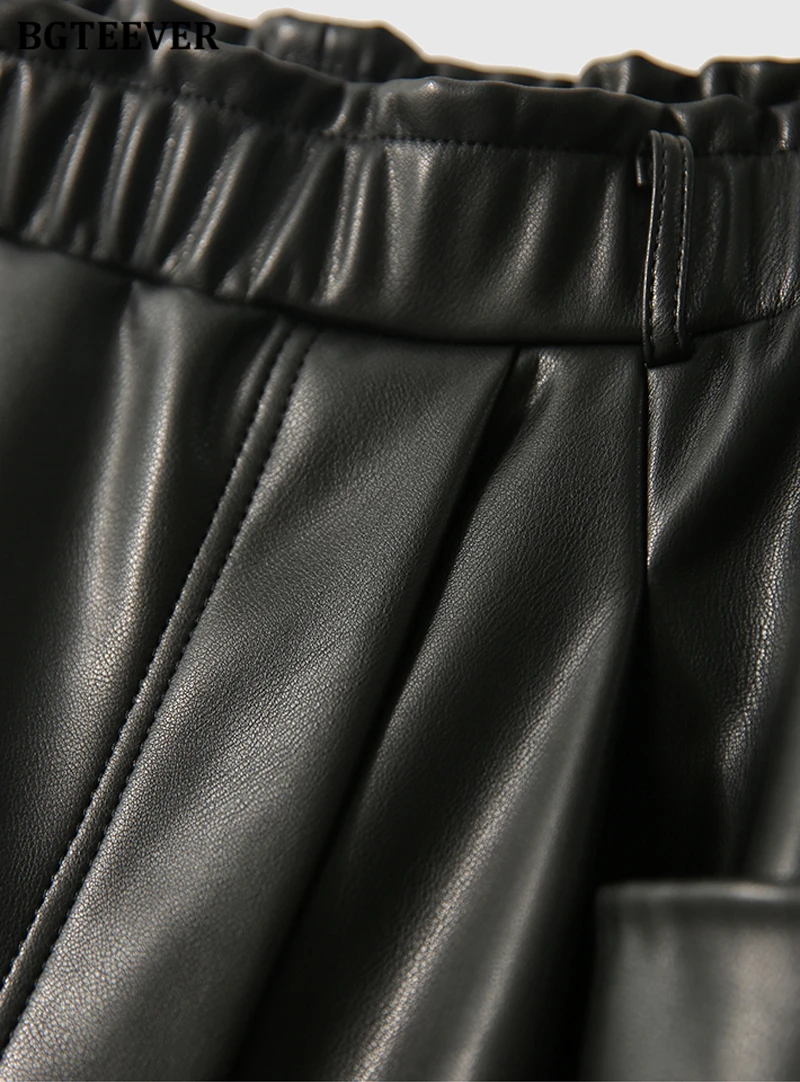 BGTEEVER Stylish Elastic Waist Women PU Leather Skirts Spring Autumn Loose Pockets Faux Leather A-line Skirts Female