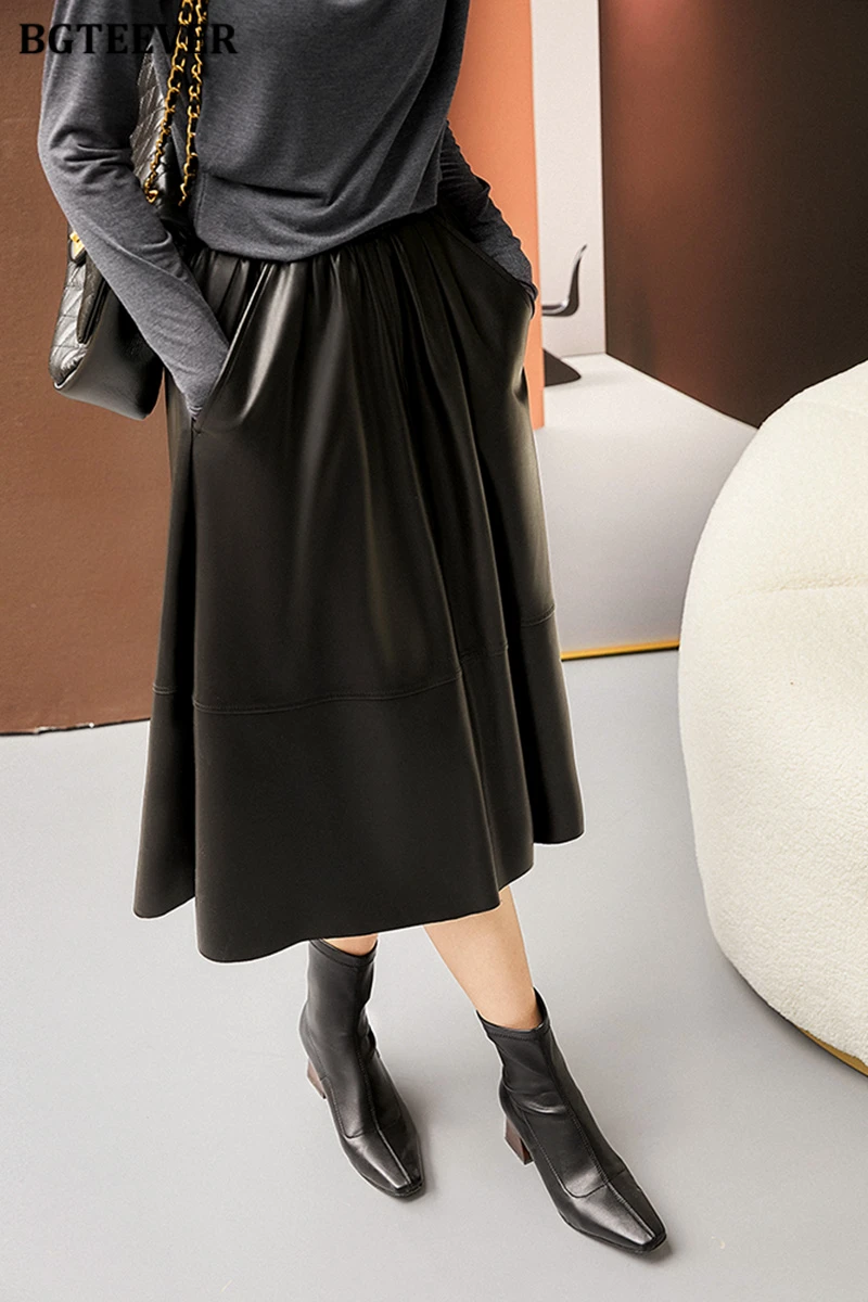 BGTEEVER Stylish Elastic Waist Women PU Leather Skirts Spring Autumn Loose Pockets Faux Leather A-line Skirts Female