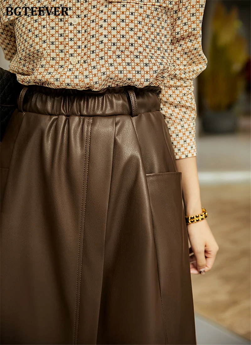 BGTEEVER Stylish Elastic Waist Women PU Leather Skirts Spring Autumn Loose Pockets Faux Leather A-line Skirts Female