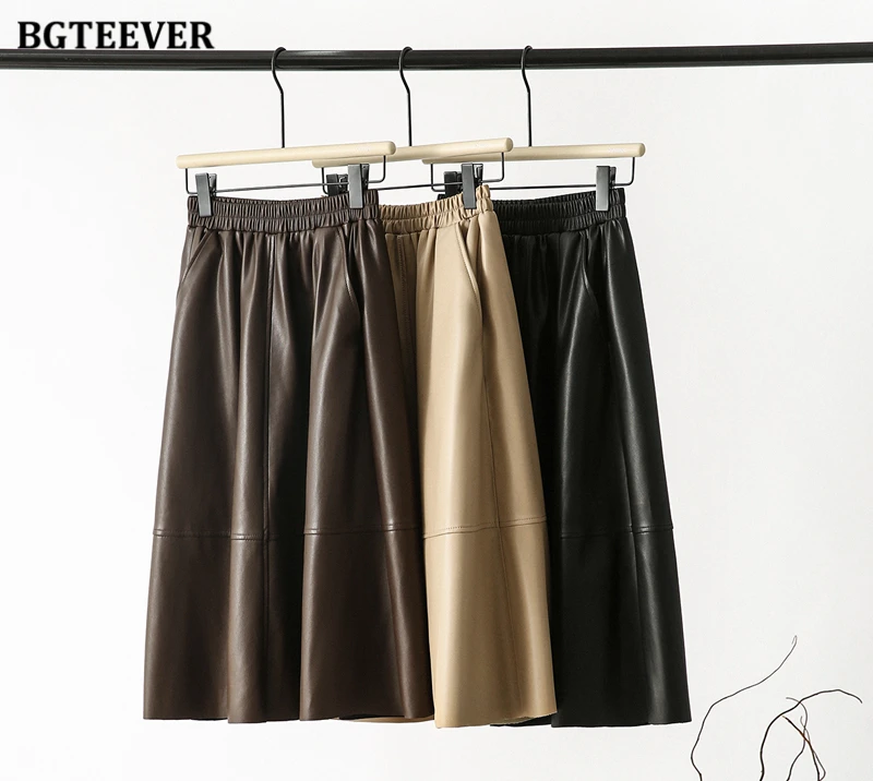 BGTEEVER Stylish Elastic Waist Women PU Leather Skirts Spring Autumn Loose Pockets Faux Leather A-line Skirts Female