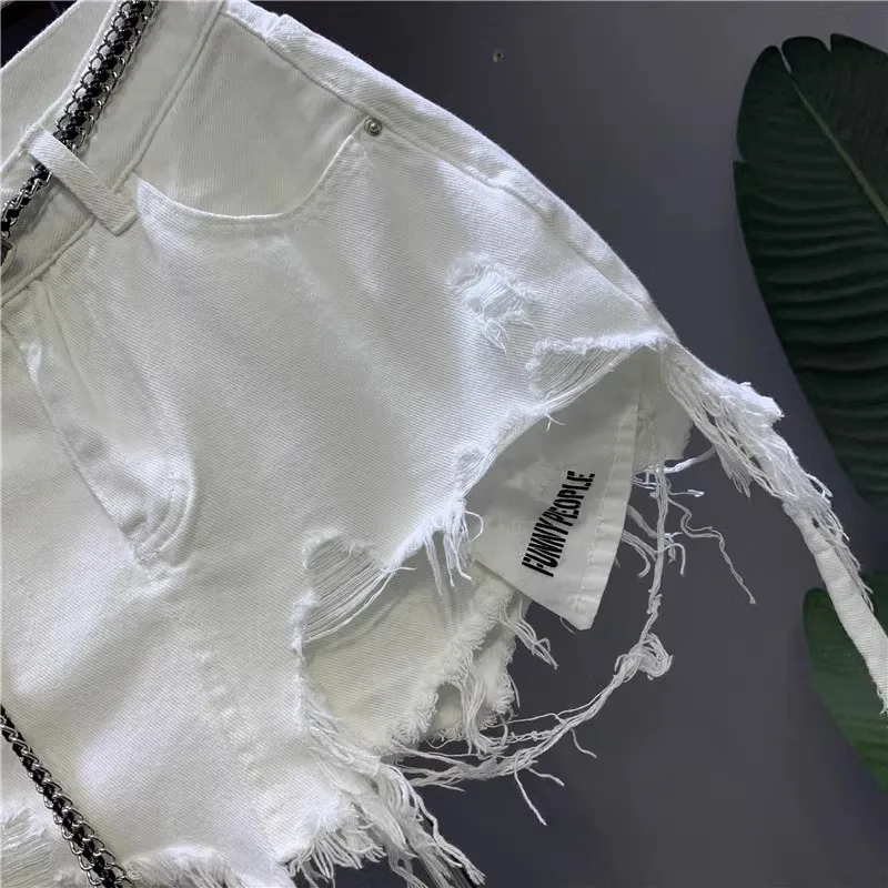 2026 New Korean White Raw Irregular Denim Skirt Women's Anti-Walk Naked Hole Pocket Exposed Short Skirt