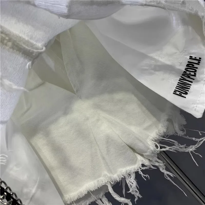 2026 New Korean White Raw Irregular Denim Skirt Women's Anti-Walk Naked Hole Pocket Exposed Short Skirt