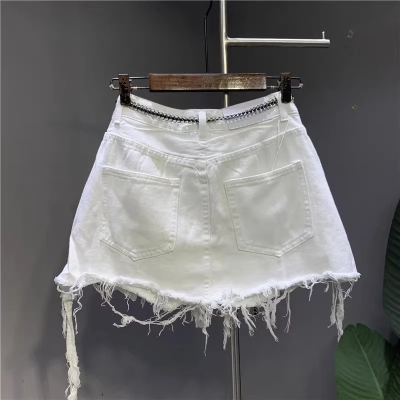 2026 New Korean White Raw Irregular Denim Skirt Women's Anti-Walk Naked Hole Pocket Exposed Short Skirt