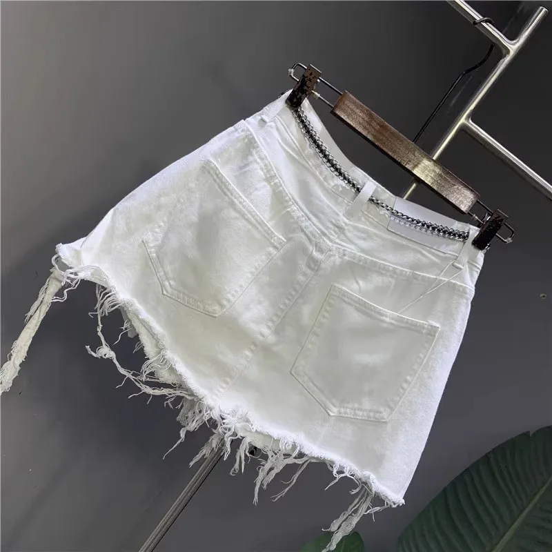 2026 New Korean White Raw Irregular Denim Skirt Women's Anti-Walk Naked Hole Pocket Exposed Short Skirt