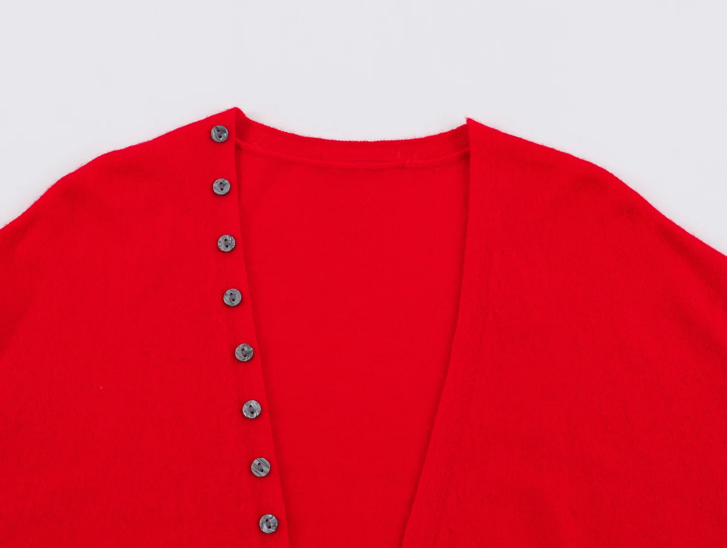 YENKYE New Autumn Women Red Deep V Neck Knit Cardigan Asymmetric Button Loose Long Sleeve Casual Sweater Coat