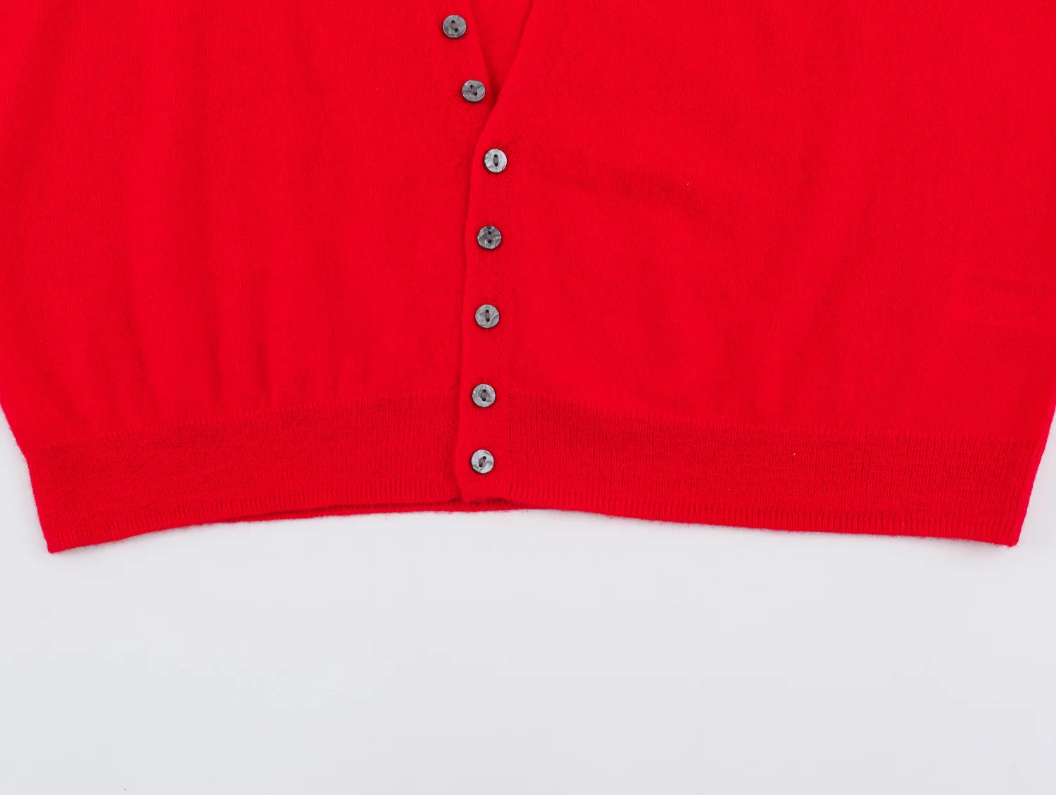 YENKYE New Autumn Women Red Deep V Neck Knit Cardigan Asymmetric Button Loose Long Sleeve Casual Sweater Coat