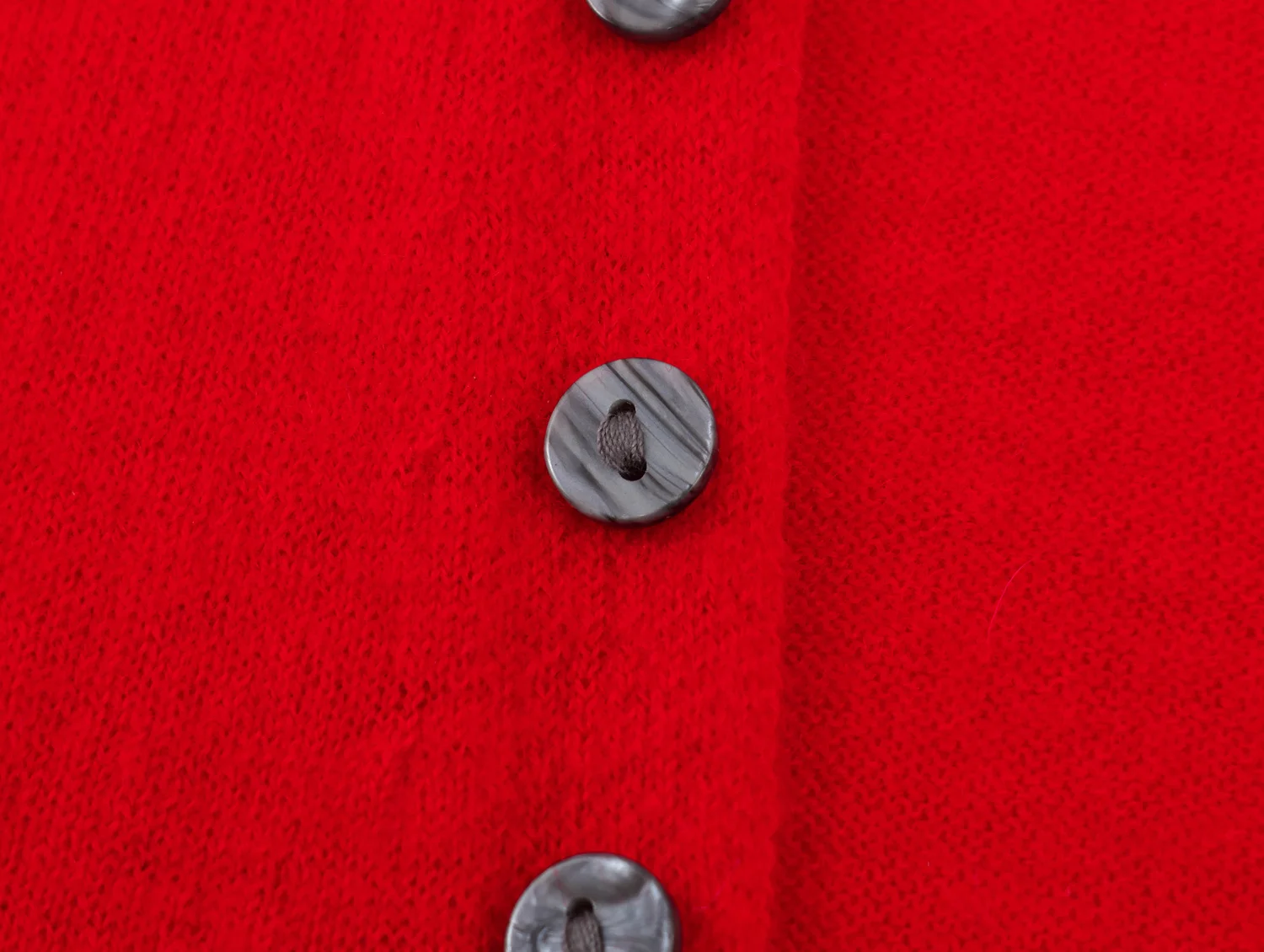 YENKYE New Autumn Women Red Deep V Neck Knit Cardigan Asymmetric Button Loose Long Sleeve Casual Sweater Coat