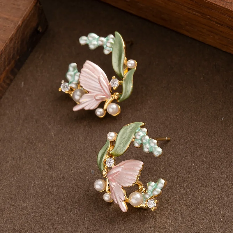 Super fairy sweet temperament fairy style oil paint inlaid pearl earrings niche personality versatile commuting earrings