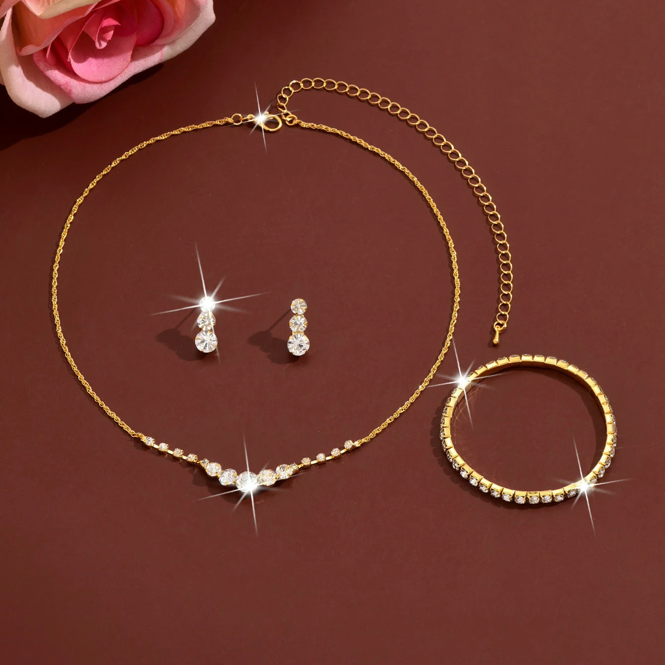 Simple rhinestone geometric stud earrings, necklace and bracelet set. Fashionable elastic wristband. Daily commuting jewelry.