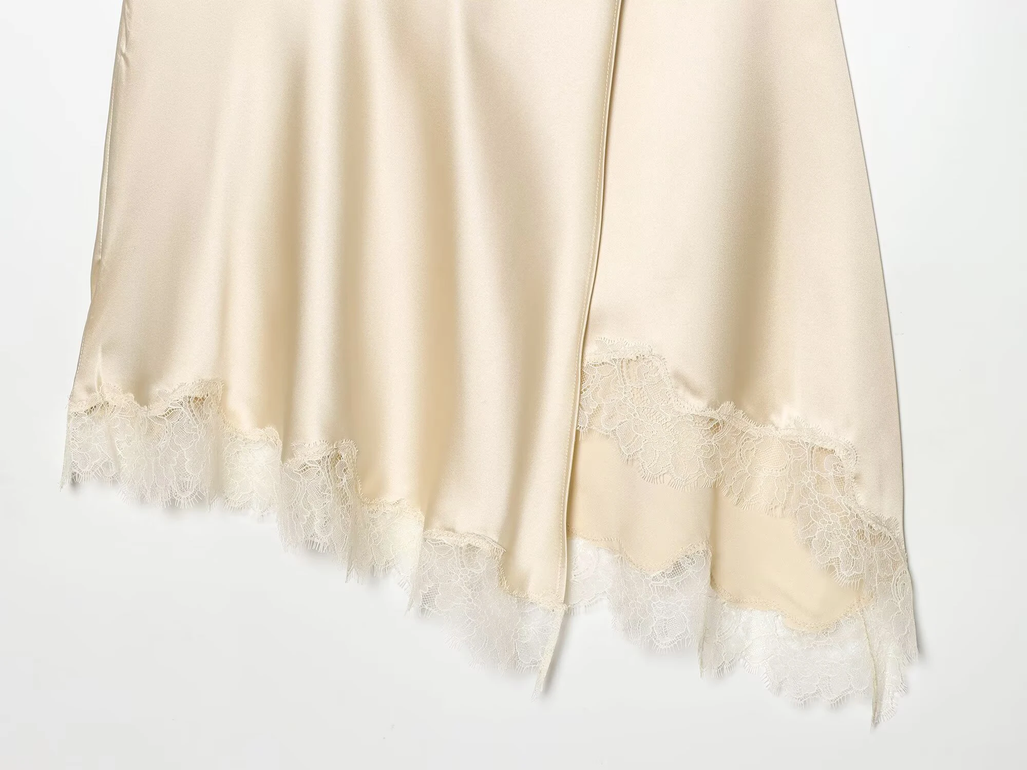 European and American style women's clothing new 2026 fashionable lace hem cross slit irregular skirt