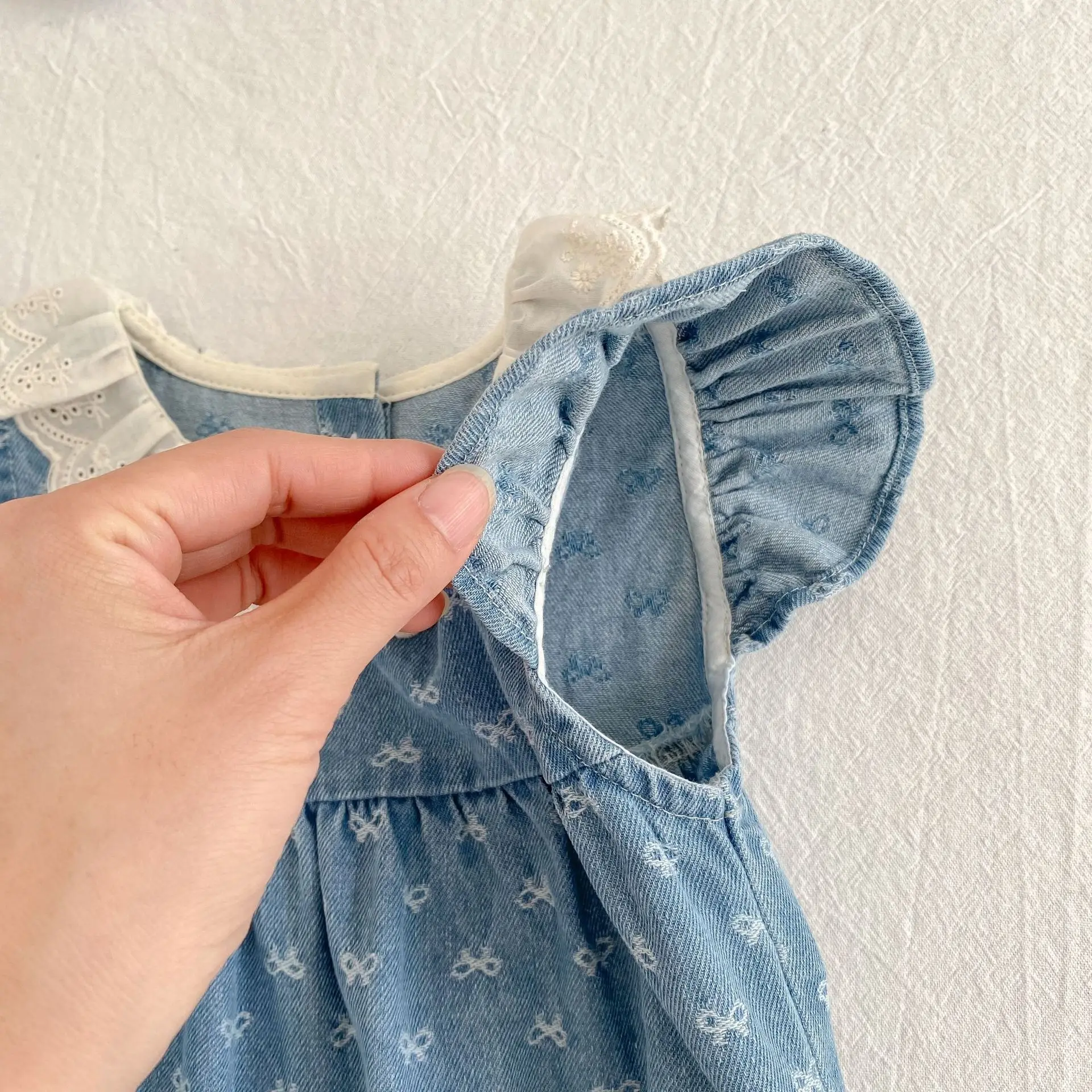 2026 Summer Newborn Baby Girl Clothing Baby Girl Denim Romper 0-24M Cotton Bow Print Baby Girl Flutter Sleeve Jumpsuit