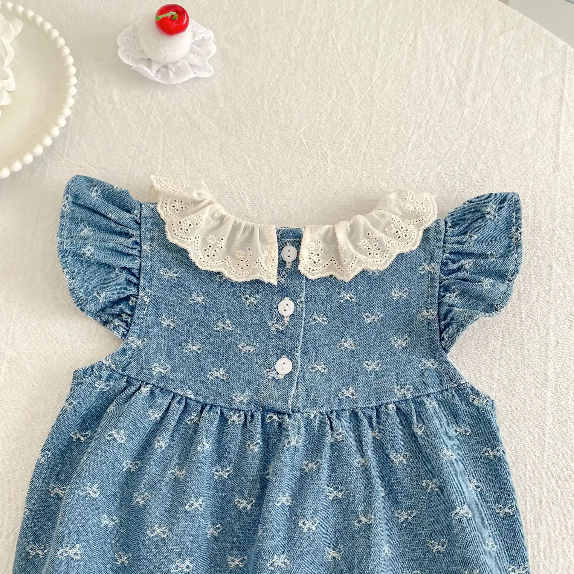 2026 Summer Newborn Baby Girl Clothing Baby Girl Denim Romper 0-24M Cotton Bow Print Baby Girl Flutter Sleeve Jumpsuit