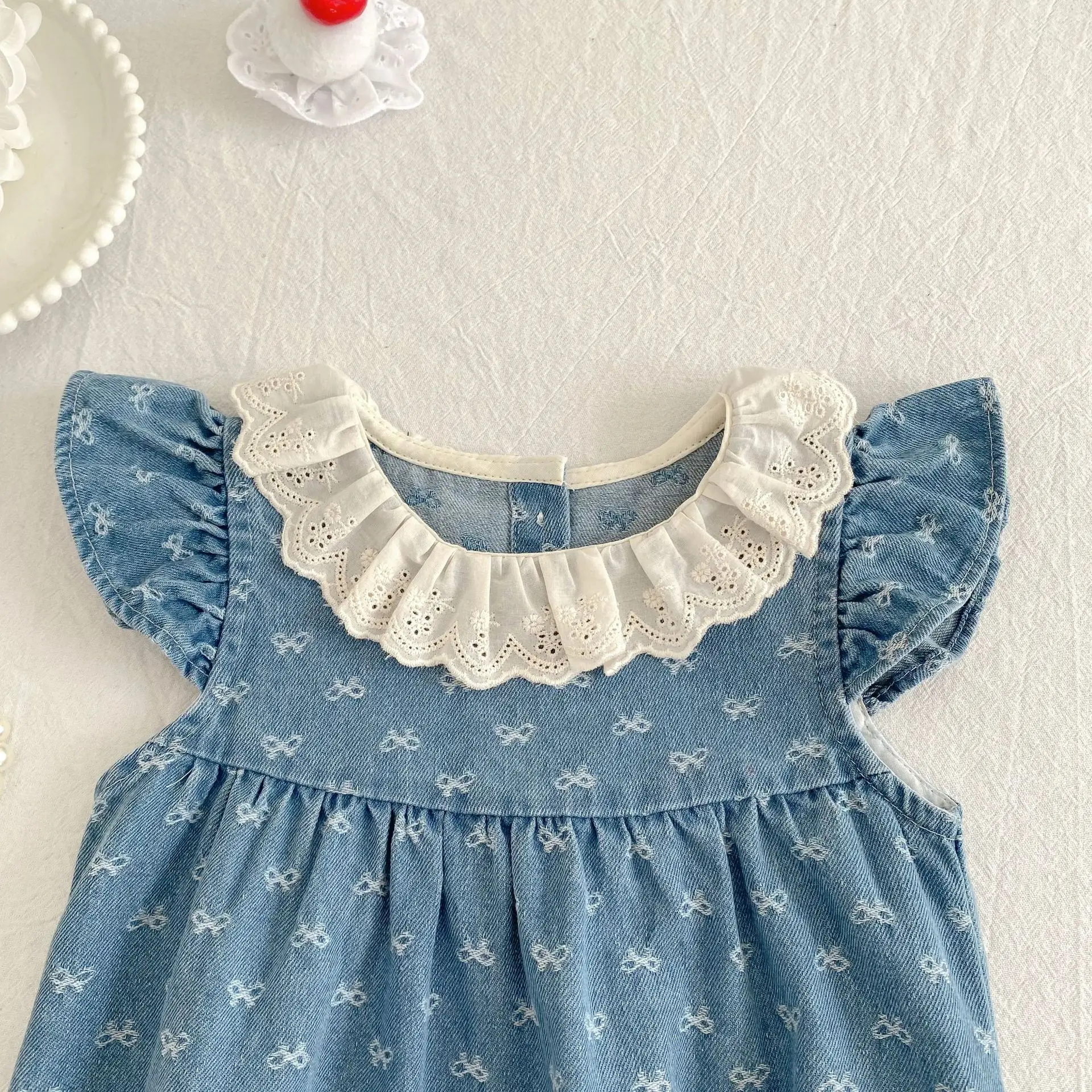 2026 Summer Newborn Baby Girl Clothing Baby Girl Denim Romper 0-24M Cotton Bow Print Baby Girl Flutter Sleeve Jumpsuit