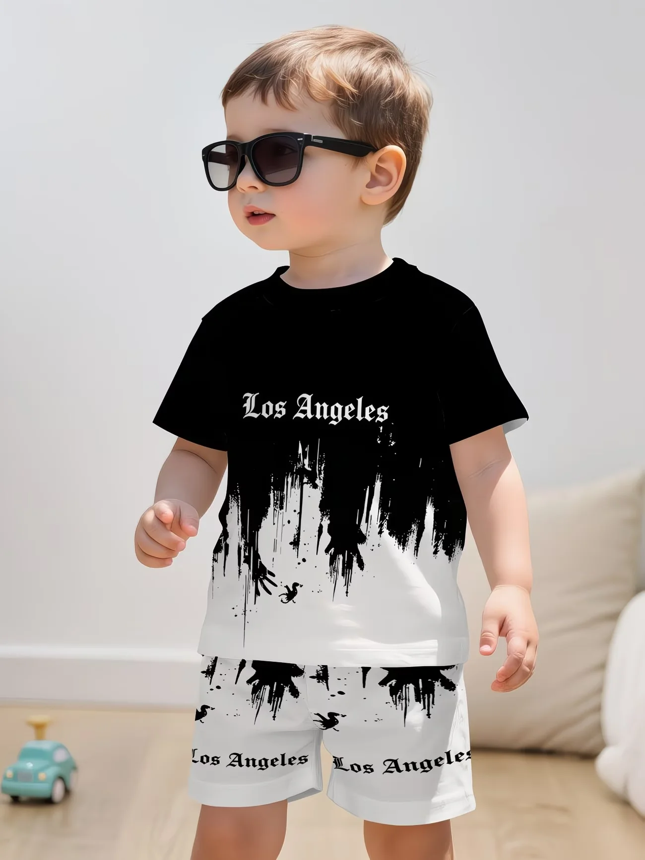 New summer splatter graffiti print top + matching shorts: children's casual streetwear.