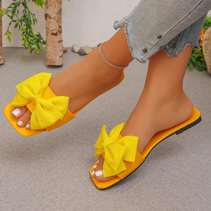 New Women's Solid Color Flat Slippers 2026 Summer Fashion Bow Design Sandals Outdoor Lightweight Casual Beach Slippers Plus Size