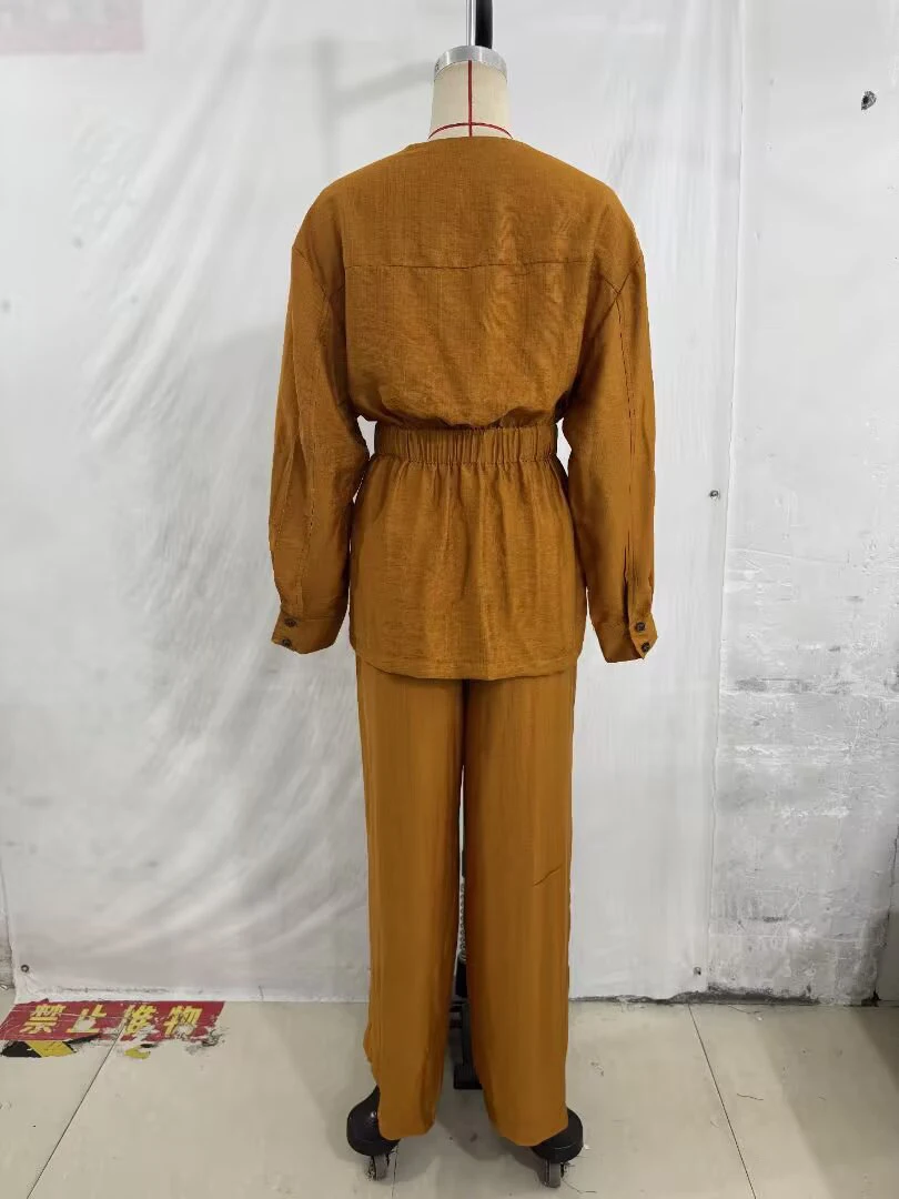 2026 round neck long sleeved hunting suit jacket with waist belt featuring a split hem and hanging high waisted pants set