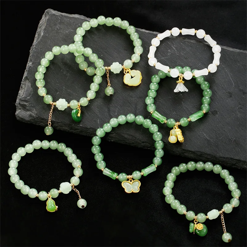 7pcs/set Everyday Sweet Butterfly Bracelet – Green Glass Beads with Delicate Pendants for Effortless, Feminine Style.